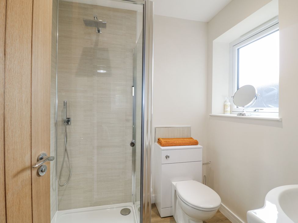 A bathroom with a shower and toilet at Fields View in Edingale near Alrewas