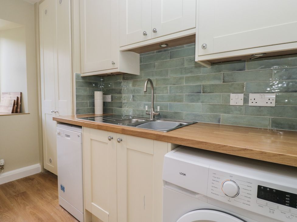 A kitchen with a sink and appliances at The Barn at Grasmere in Grasmere