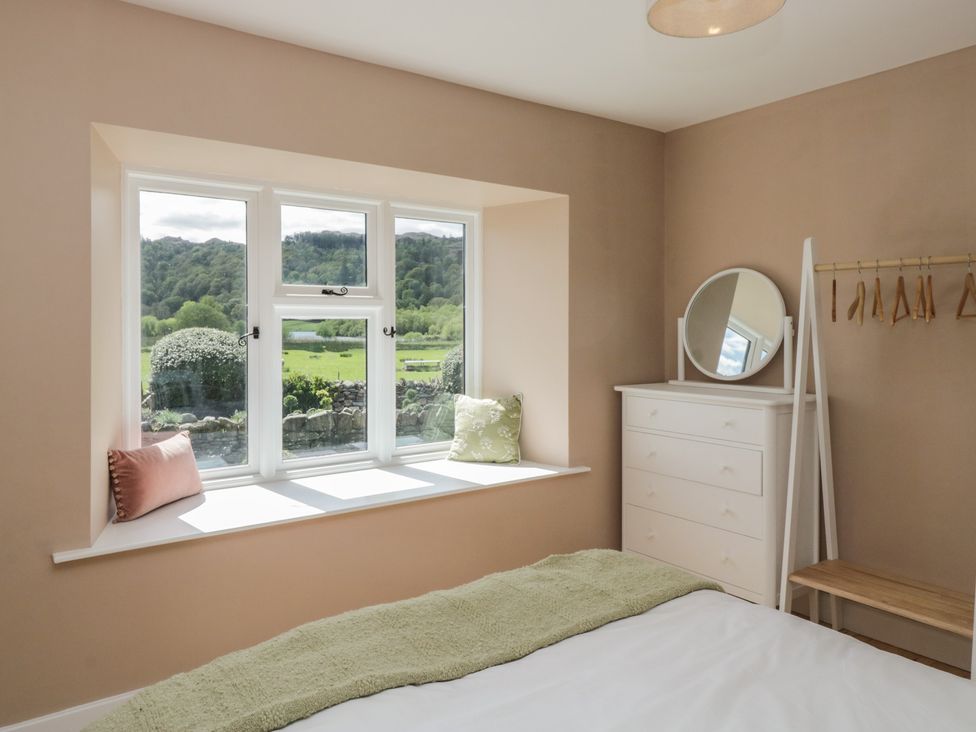 A bedroom with a window and a bed at The Barn at Grasmere in Grasmere