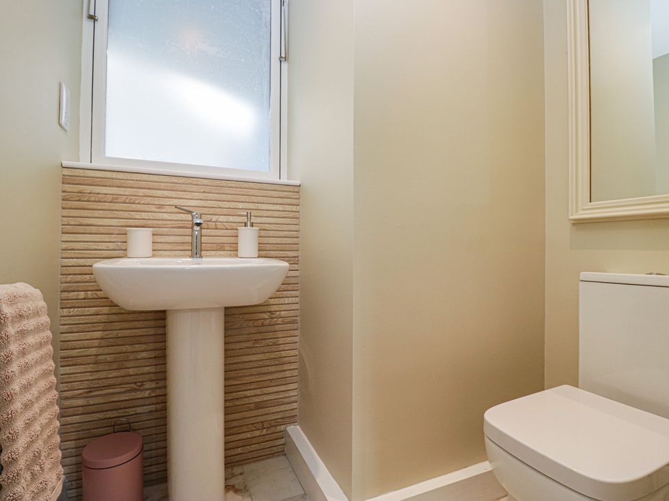 A bathroom with a sink and toilet at The Barn at Grasmere