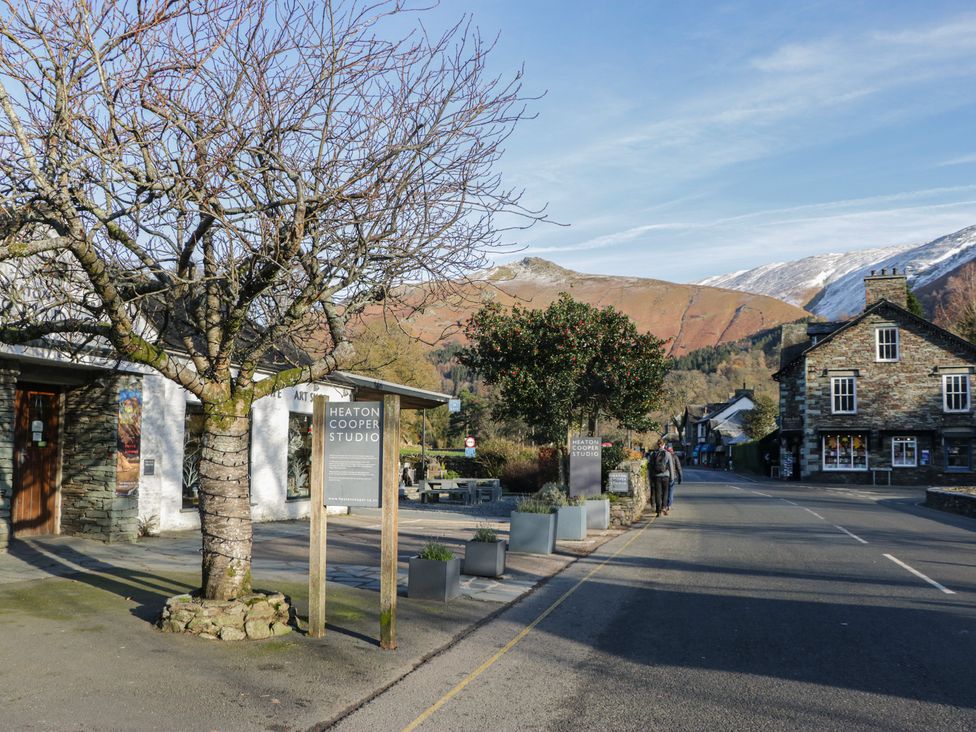 A street with a building and a tree at The Barn at Grasmere in Grasmere