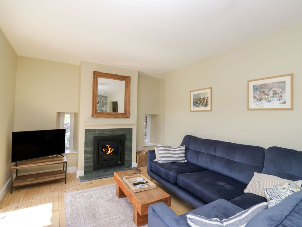 A living room with a sofa and television at The Barn at Grasmere, Grasmere