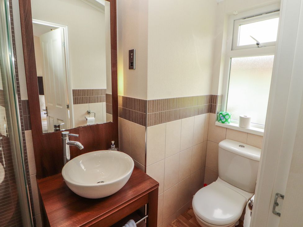 A bathroom with a sink and toilet at 28 Troutbeck in Bassenthwaite