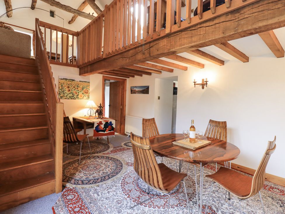 A dining room with a table and chairs at Chapel Cottage Ennerdale near Cleator Moor