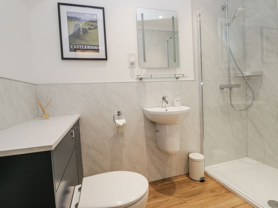 A bathroom with a shower and toilet at Swift Barn in Wigton