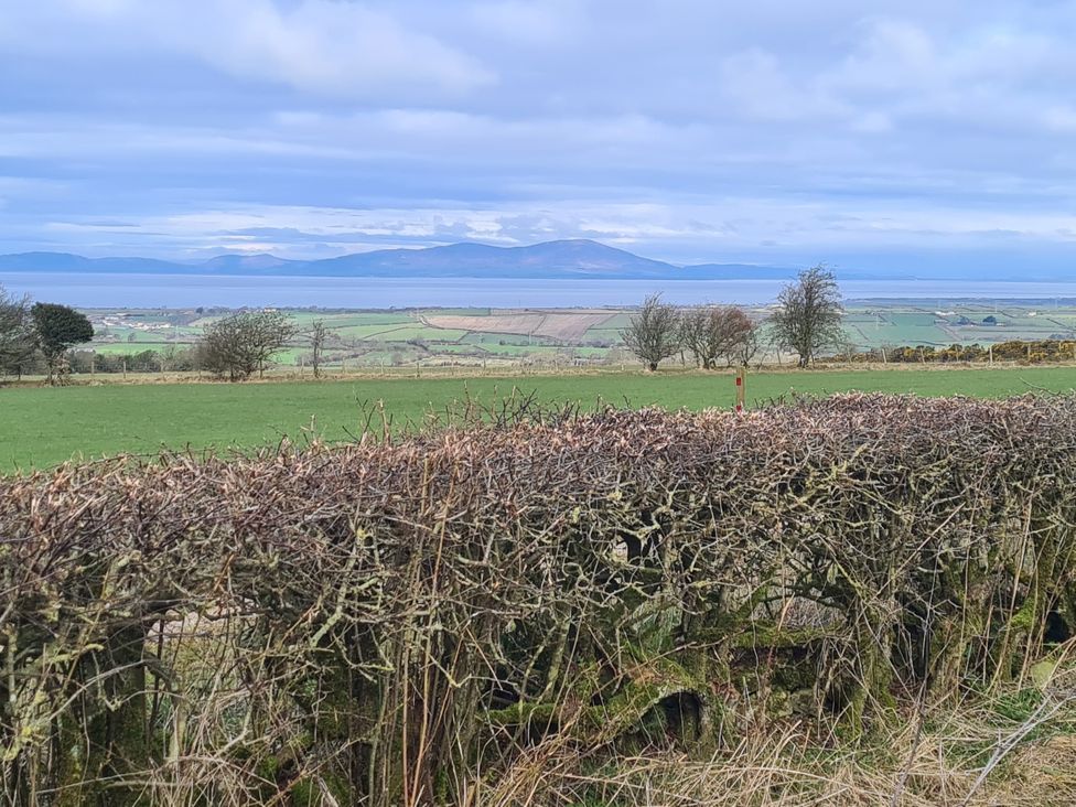 A view of fields and mountains at Swift Barn in Gilcrux