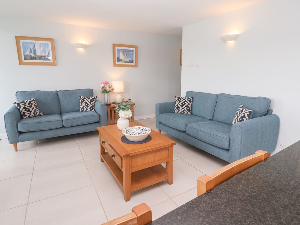 A living room with sofas and a coffee table at Tobys Quay Falmouth