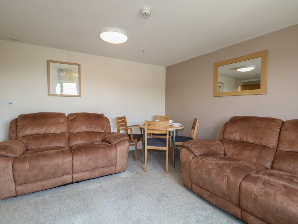 A living room with furniture and a dining area at Flat 2 in Littlehampton