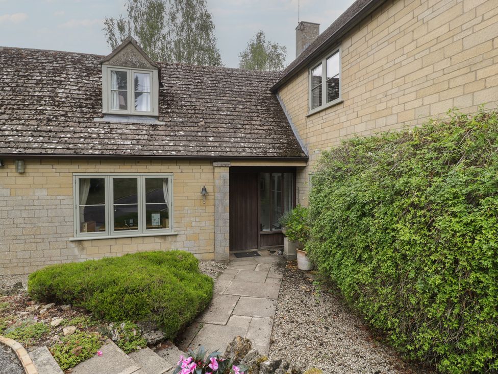 An outdoor entrance with a door and window at St. Marys House Church Westcote near Bledington