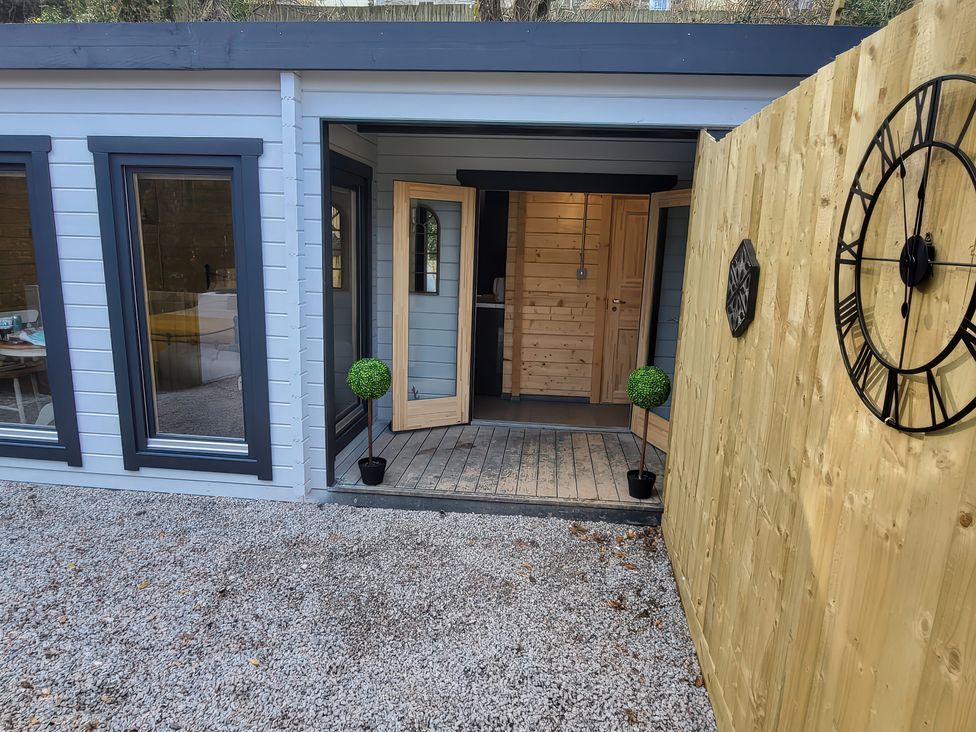 An outdoor area with a path and door at Sea La Vie in Perranporth