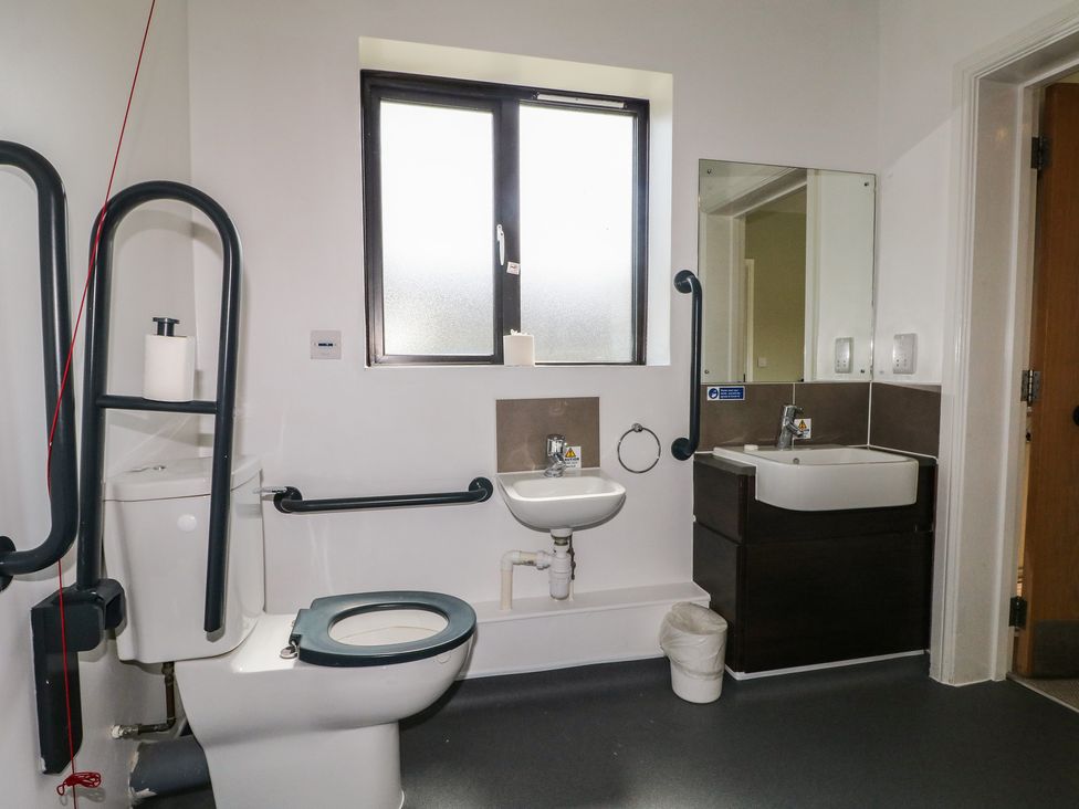 A bathroom with a sink and toilet at Bedroom 6, Littlehampton