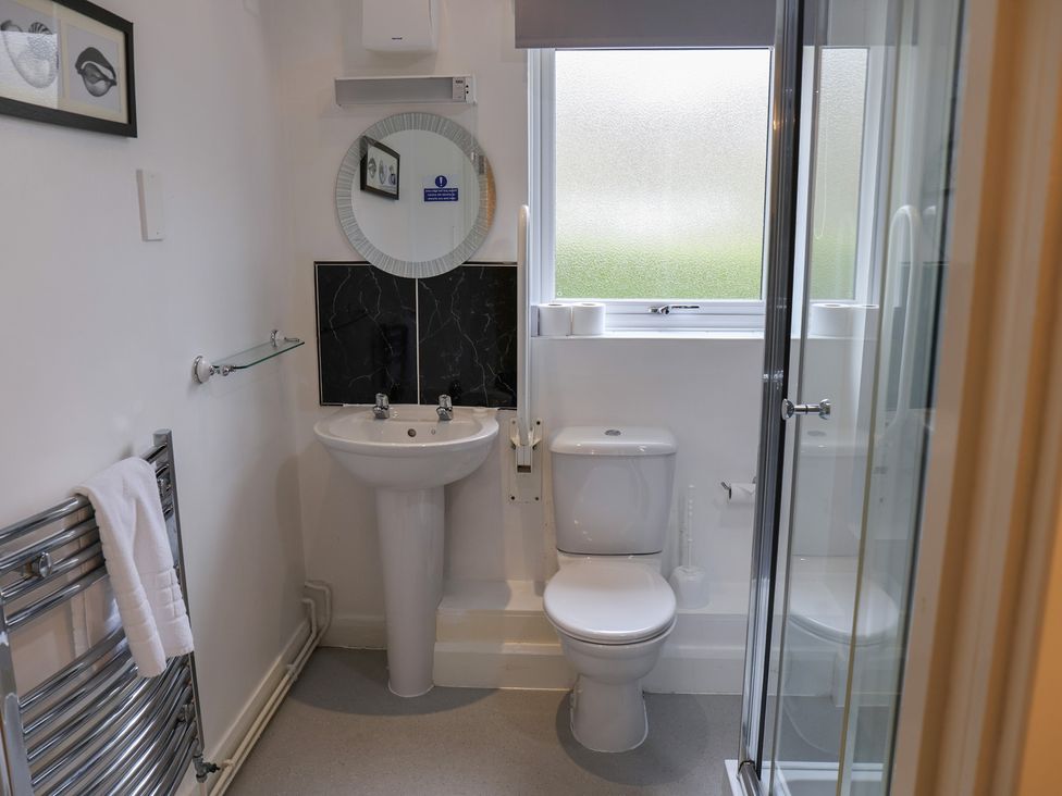 A bathroom with sink and shower at Bungalow 15 Eamont Park in Penrith