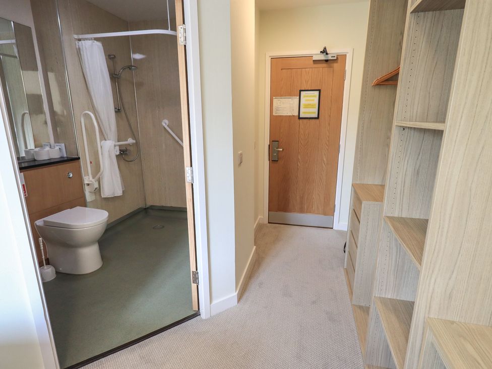 A bathroom with a shower and toilet at Bedroom 2 in Penrith
