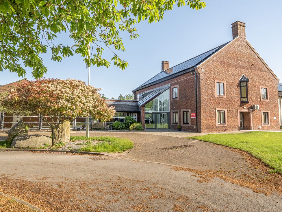 A building with trees and rocks in an outdoor area at Jubilee Ground-floor Single Bedroom Penrith