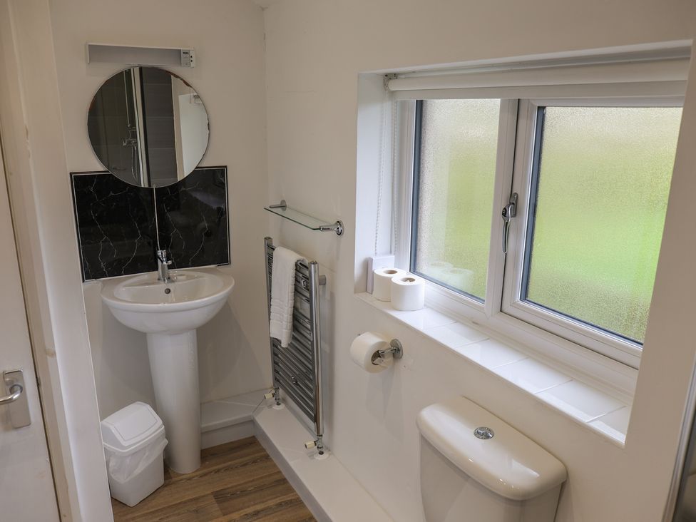 A bathroom with a sink and toilet at House 8 Eamont Park in Penrith