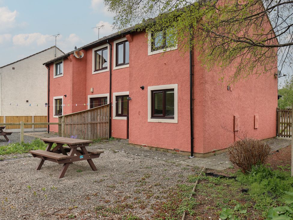 An outdoor area with a picnic table at House 8 Eamont Park in Penrith