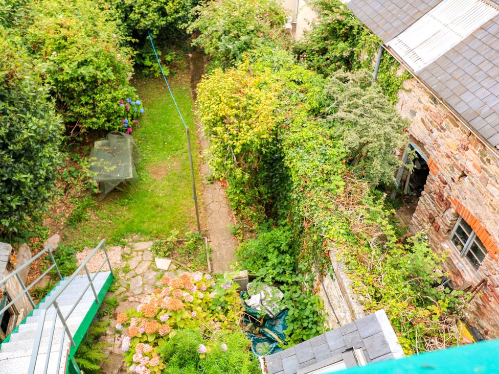 A garden with greenery and steps at Castleview Apartment, 21 South Embankment, Dartmouth