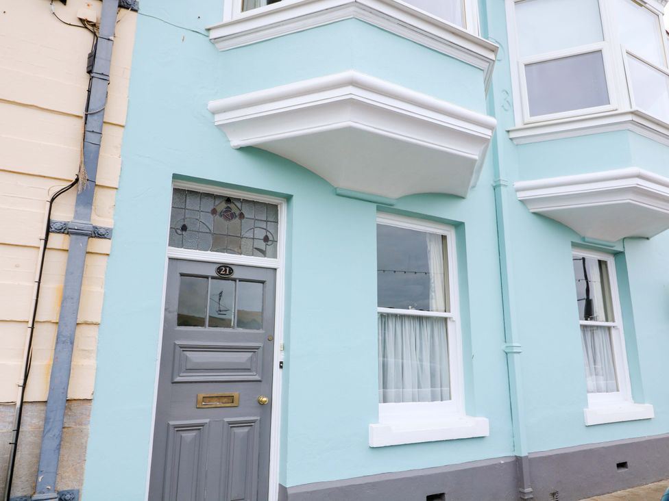 A building facade with a door and windows at Castleview Apartment, 21 South Embankment Dartmouth