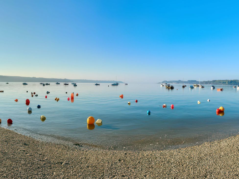 A view of water with buoys and boats at The Studio Feock near Truro