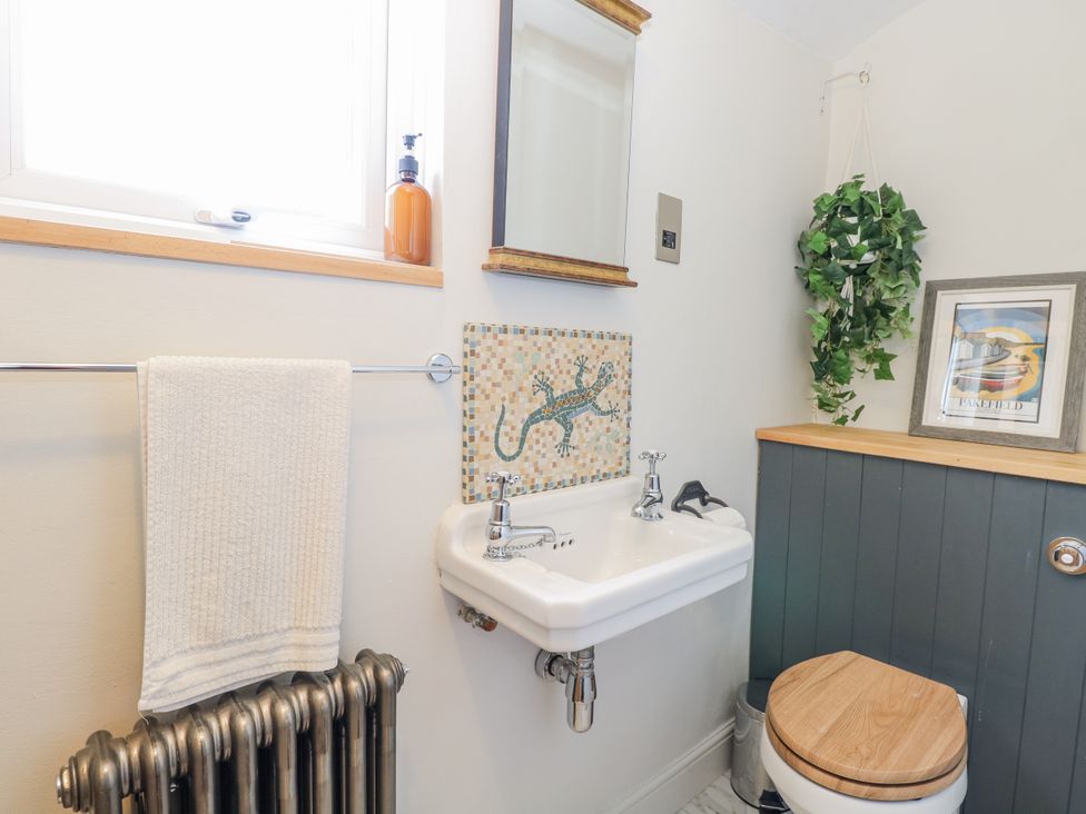 A bathroom with a sink and toilet at 18 Pakefield Road in Lowestoft