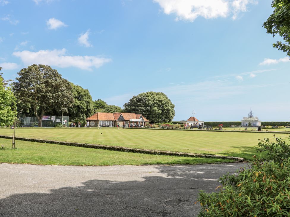 A building surrounded by grass and trees at 18 Pakefield Road in Lowestoft