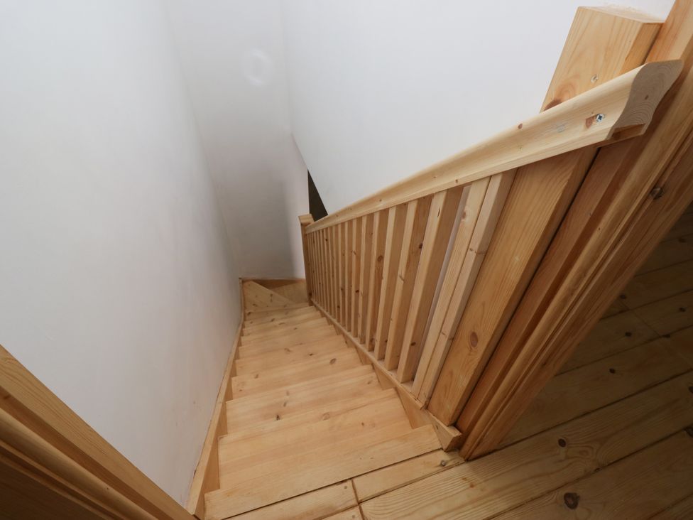 A staircase leading down at the Old Post Office Cottage in Ulverston