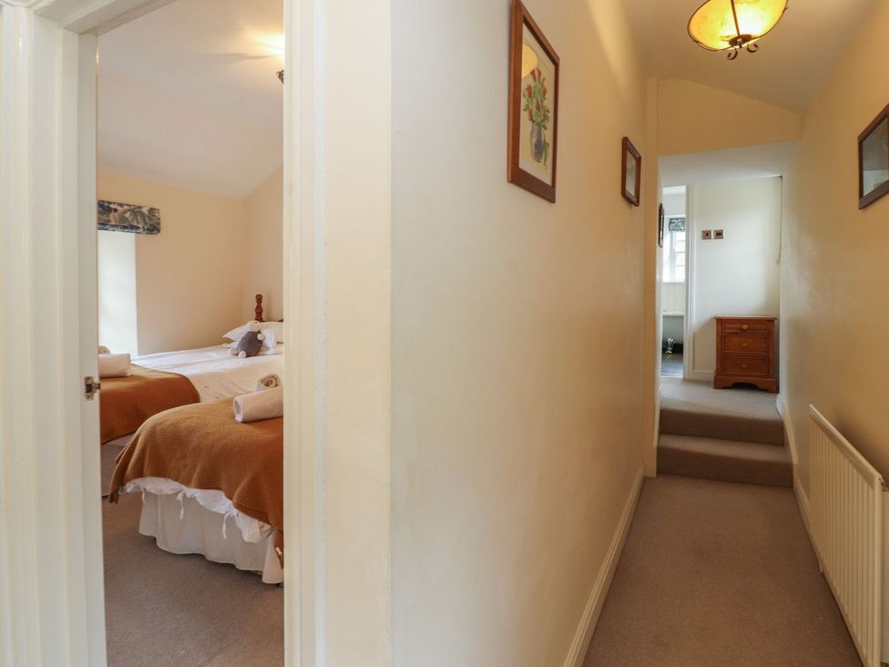 A hallway leading to a bedroom at Deer How Farm in Patterdale near Glenridding