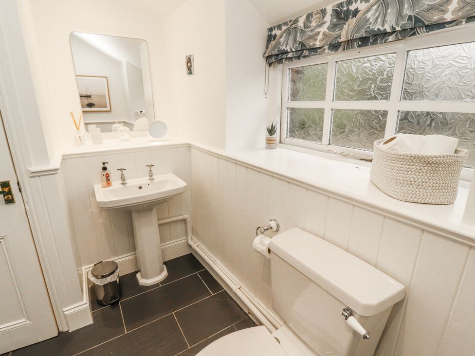A bathroom with a sink and toilet at Deer How Farm in Patterdale near Glenridding