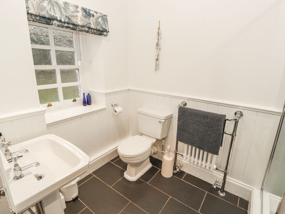 A bathroom with a sink and a toilet at Deer How Farm Patterdale near Glenridding