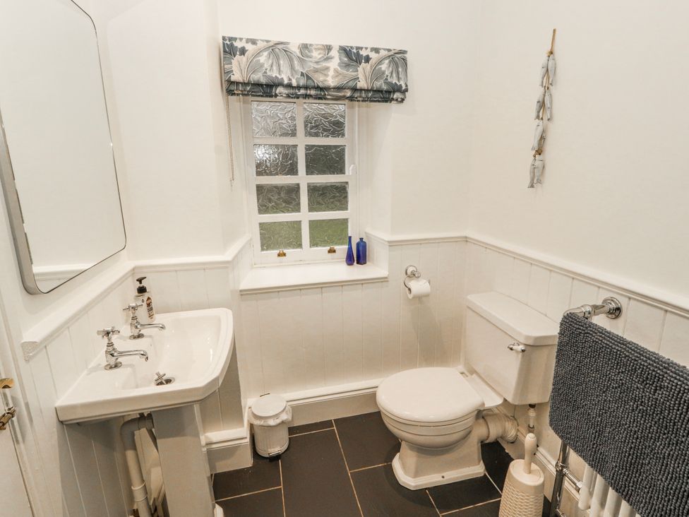 A bathroom with a sink and toilet at Deer How Farm in Patterdale near Glenridding
