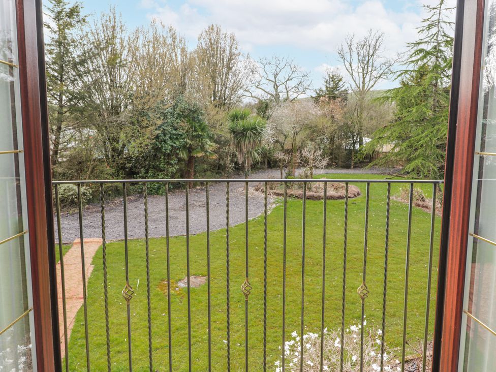 A view from a balcony showing a garden at Carreg Llwyd in Groeswen near Trecenydd