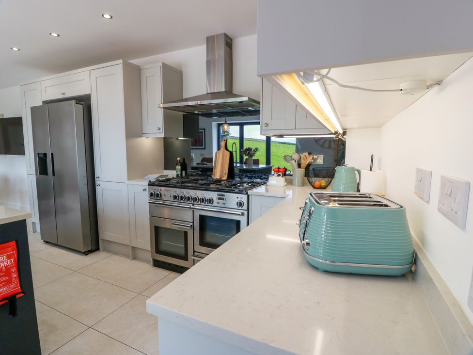 A kitchen with appliances and utensils at Balcarry Barn Glenluce