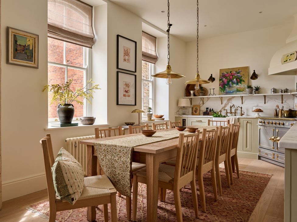 A kitchen with a dining table and chairs at Castle Corner, The Georgian House in Ludlow