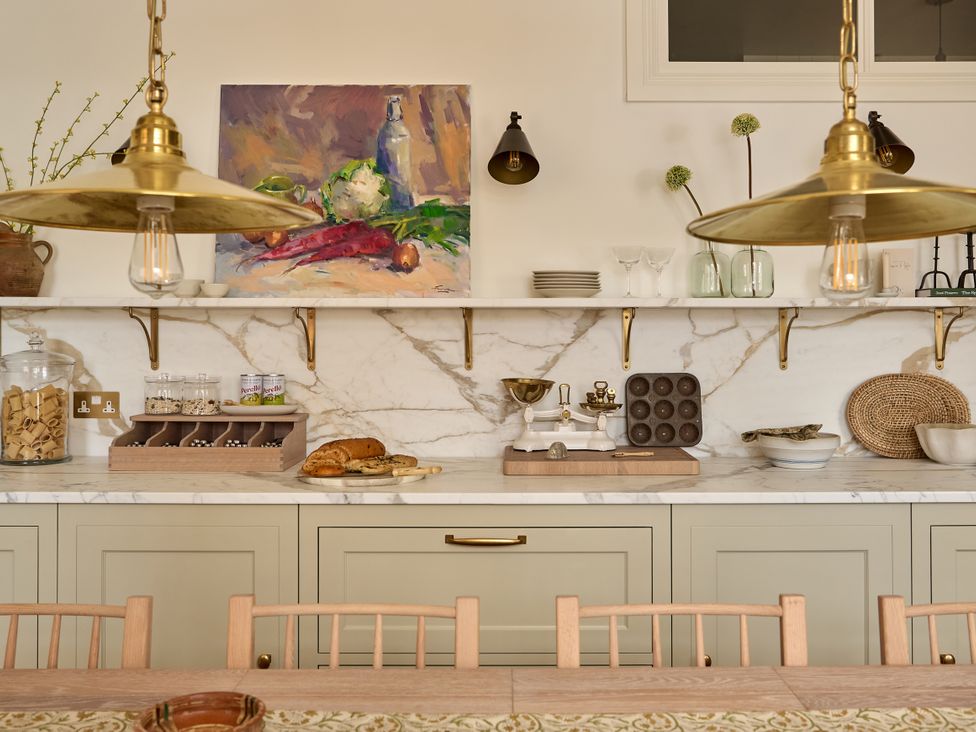 A kitchen with shelves and various kitchen items at Castle Corner, The Georgian House, Ludlow
