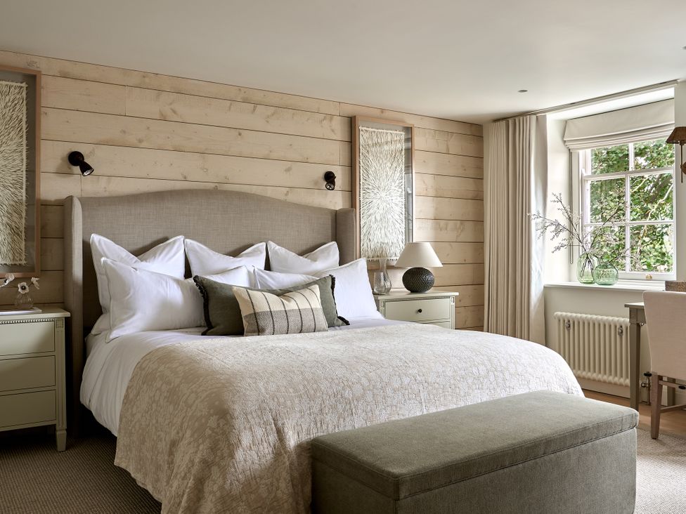 A bedroom with a bed and nightstand at Stretton Hills Peaks - The Georgian House, Ludlow