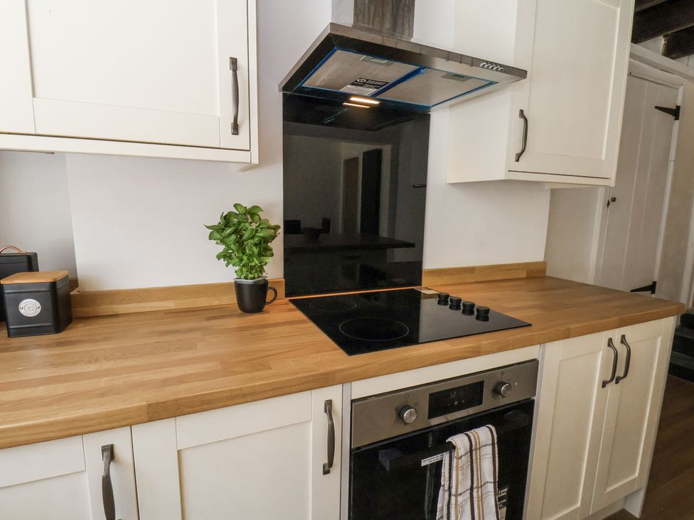 A kitchen with stove and oven at Hemdin Cottage in Thornton Dale