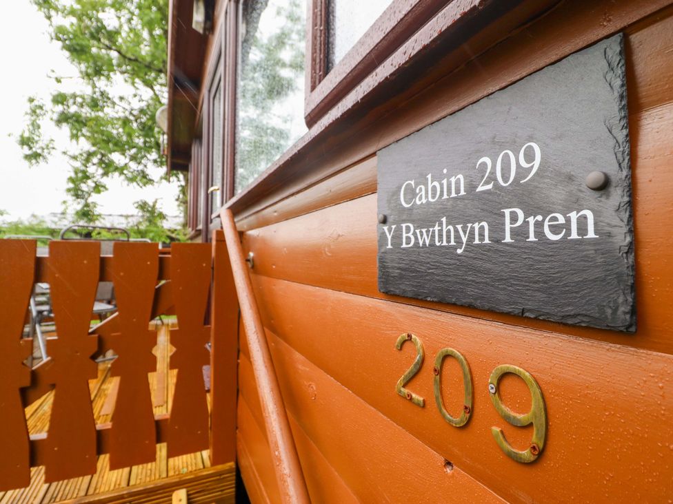 A cabin sign at Y Bwthyn Pren, Cabin 209, Trawsfynydd