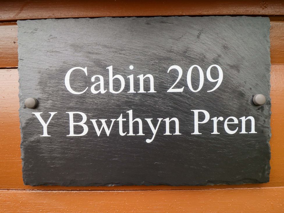 A sign displaying Cabin 209 and Y Bwthyn Pren at Y Bwthyn Pren, Cabin 209, Trawsfynydd
