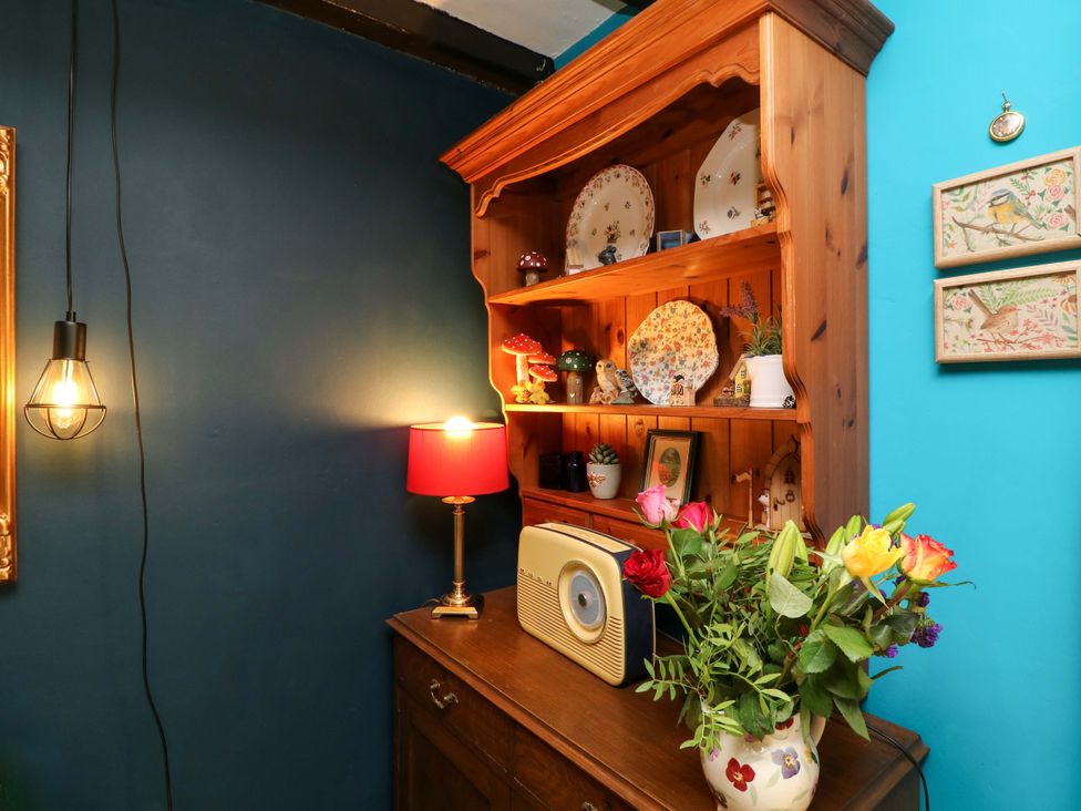 A corner with a shelf, lamp, and radio at 37 East Lane, Mansfield