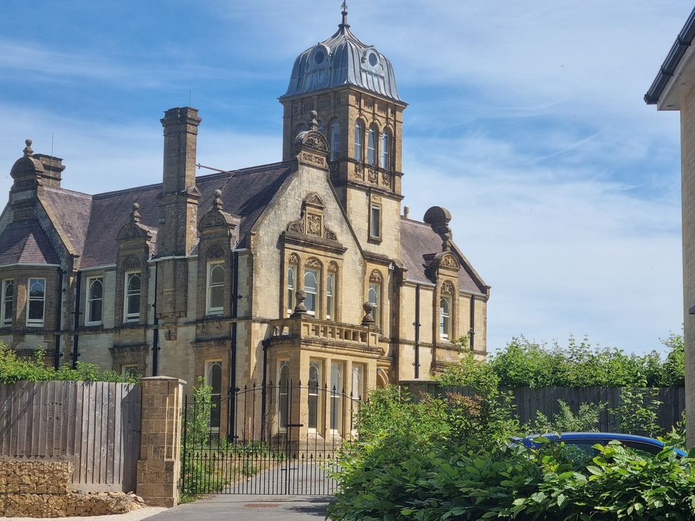 A historical building with detailed architecture at The Coach House in Castle Cary