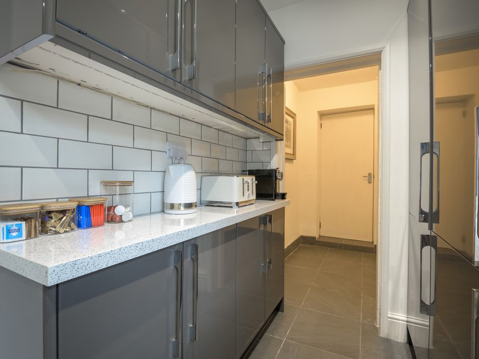 A kitchen with countertop and appliances at Moss Crag in Glenridding