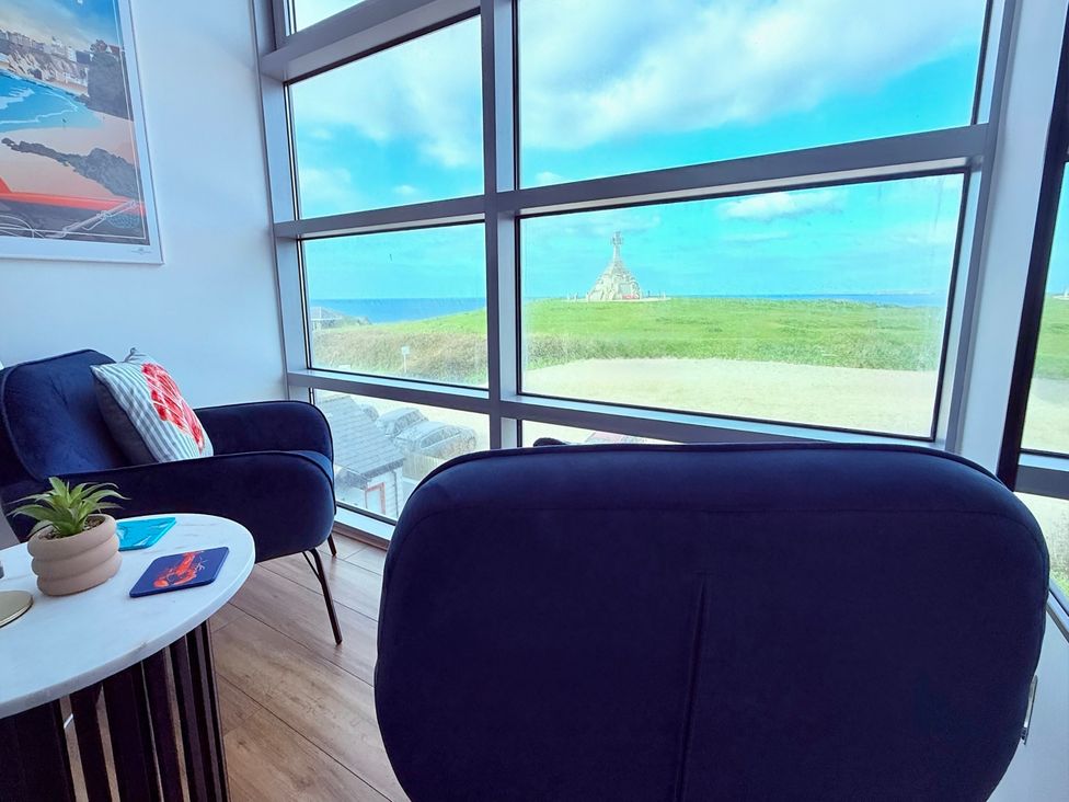 A living room with a view of the ocean at Penthouse @46Zinc - Headland View, Newquay