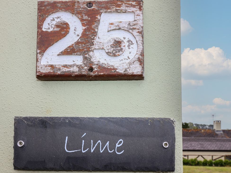 A house number 25 and name sign Lime at Harcombe House Bungalow 25 in Chudleigh