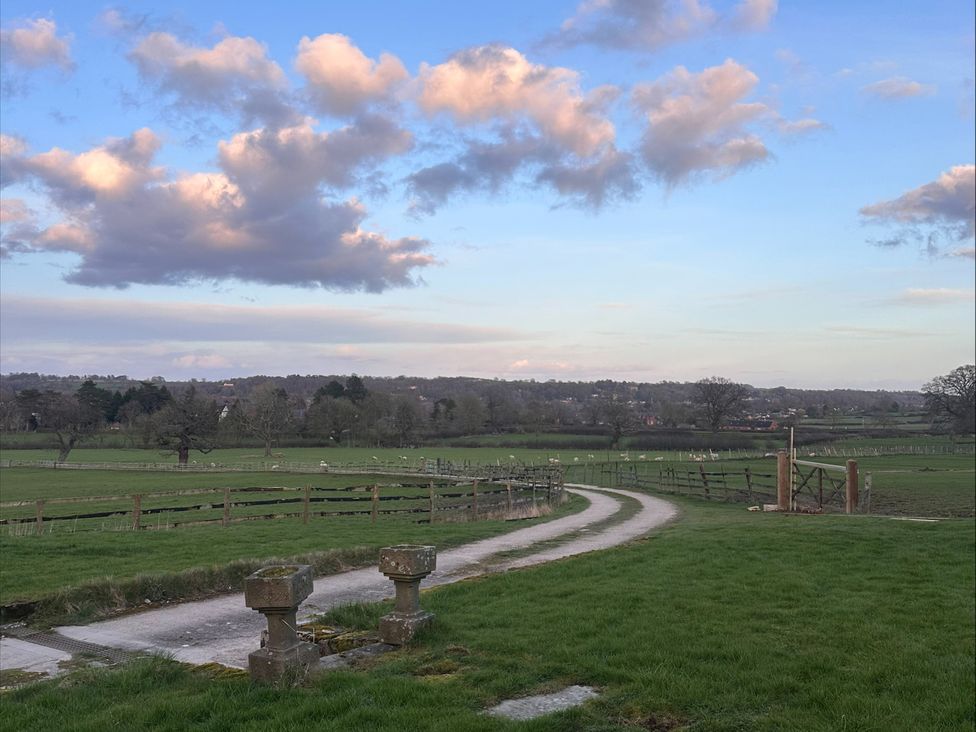 A pathway leading through fields at Farnah House Barn in Duffield