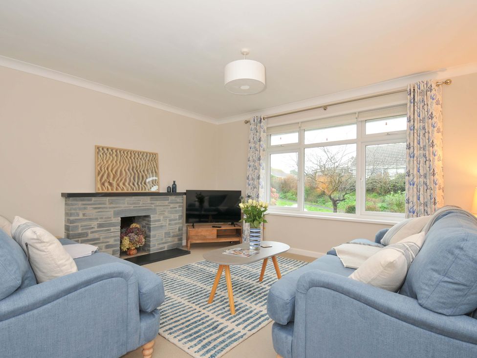 A living room with sofas and a coffee table at 42 Little Trelyn in Rock