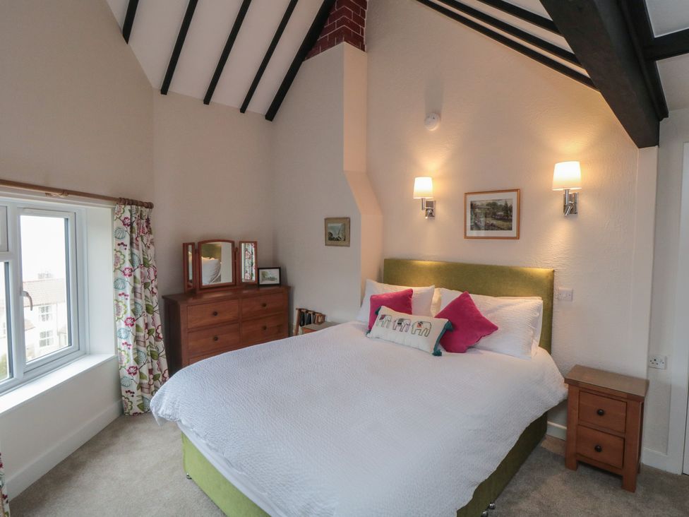 A bedroom with a bed and chest of drawers at Iveridge Sandsend