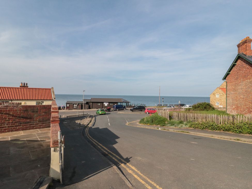 An outdoor view of a road leading to the ocean at Iveridge Sandsend