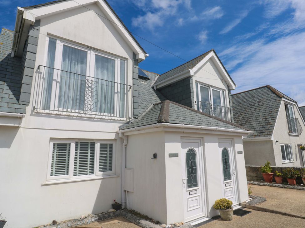 A house exterior with entrance doors and windows at Fistral Palms 2 Newquay