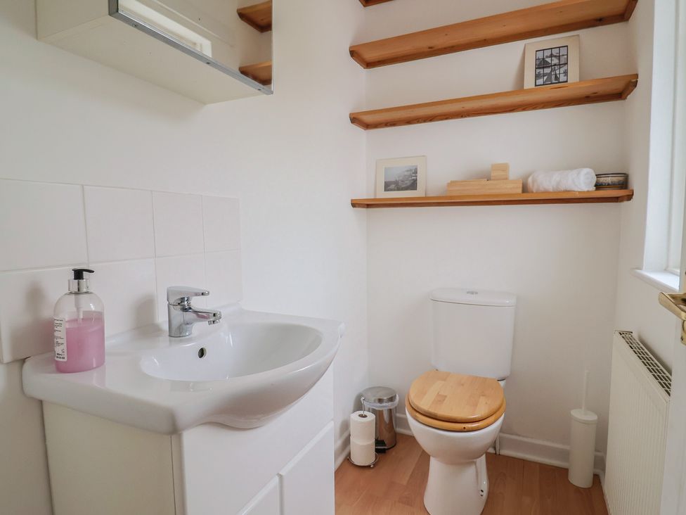 A bathroom with a sink and toilet at 20 Lym Close Lyme Regis