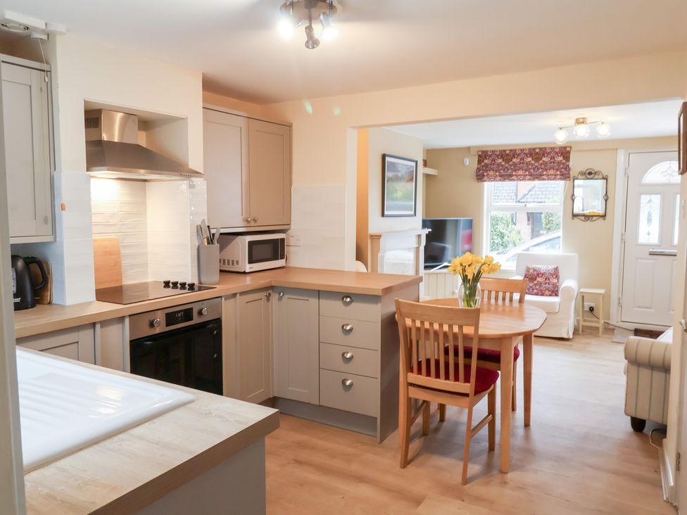 A kitchen with countertop and dining area at Deben Road in Woodbridge